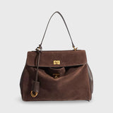 Vintage-Inspired Brown Suede Shoulder Bag with Flap Closure
