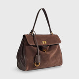 Vintage-Inspired Brown Suede Shoulder Bag with Flap Closure
