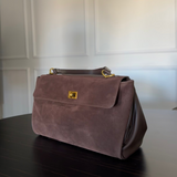 Vintage-Inspired Brown Suede Shoulder Bag with Flap Closure