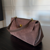 Vintage-Inspired Brown Suede Shoulder Bag with Flap Closure